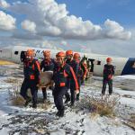 ADIYAMAN (PERRE) - Şeriban ÖZÇAKMAK - Adıyaman Havalimanı Müdürlüğü tarafından her yıl düzenlenen Acil Durum Planı çerçevesinde bu yıl da uçak düşme tatbikatı yapıldı.